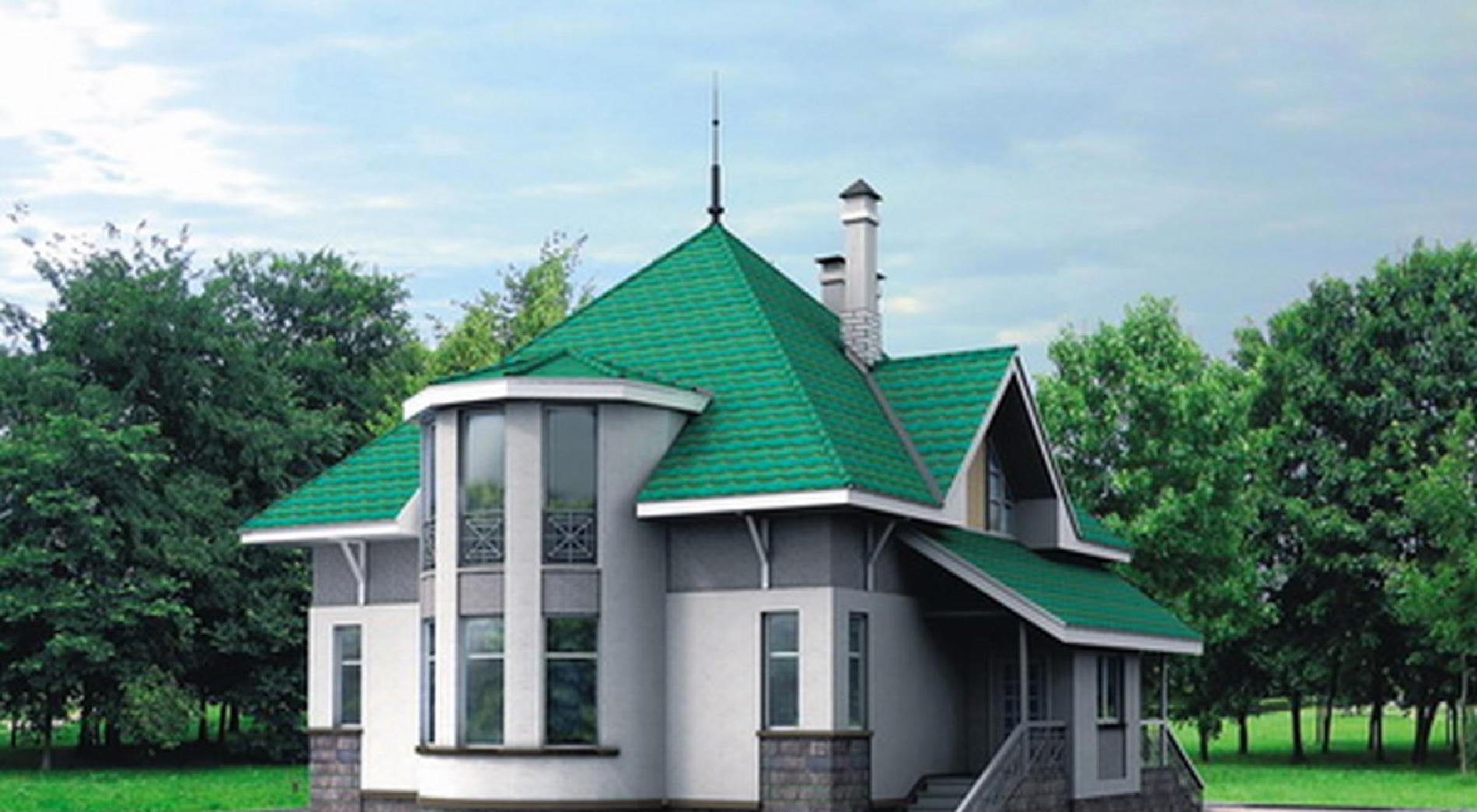 Белый дом с зеленой крышей